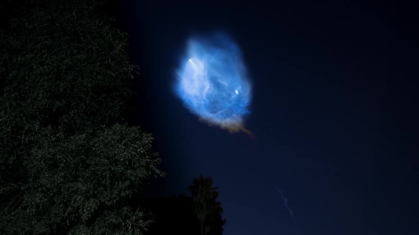 A flare shoots in to the sky and ignites
