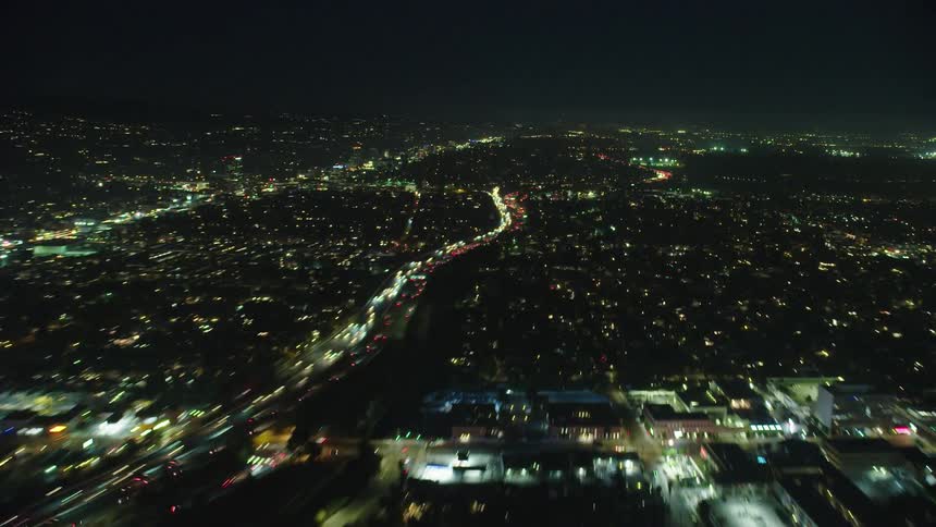 Sped up footage of heavy traffic on city freeway