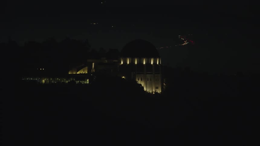 Aerial footage of observatory at night