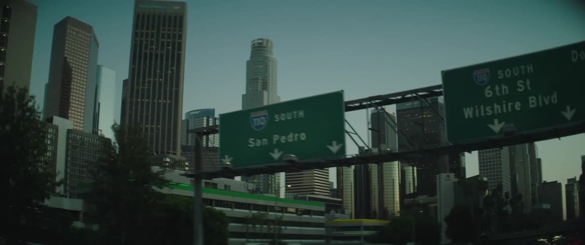 Buildings and skyscrapers in a downtown city is displayed