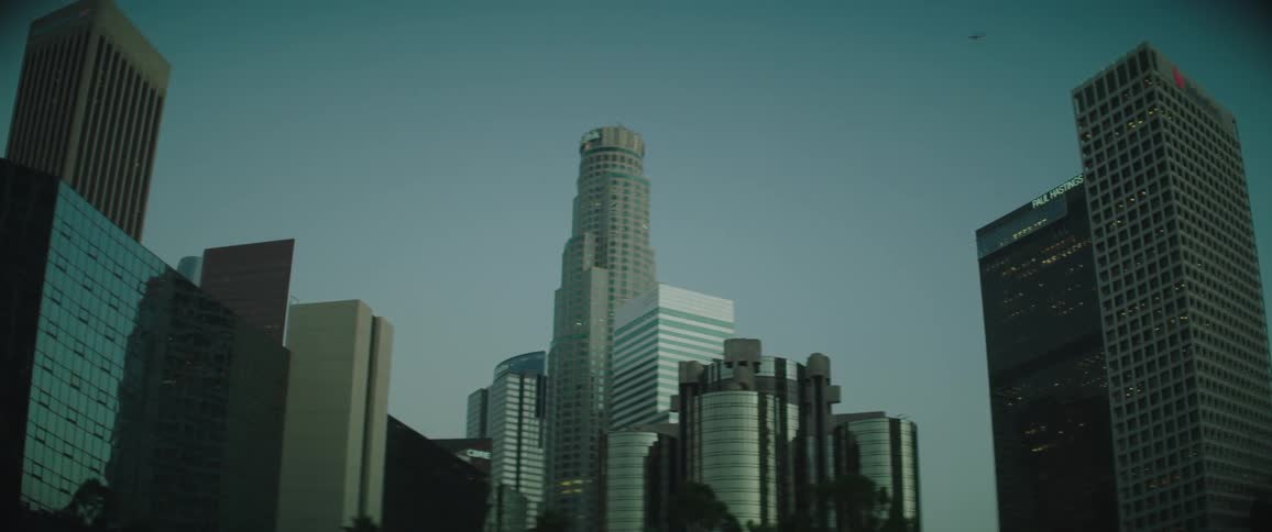 Tall buildings in city downtown at day