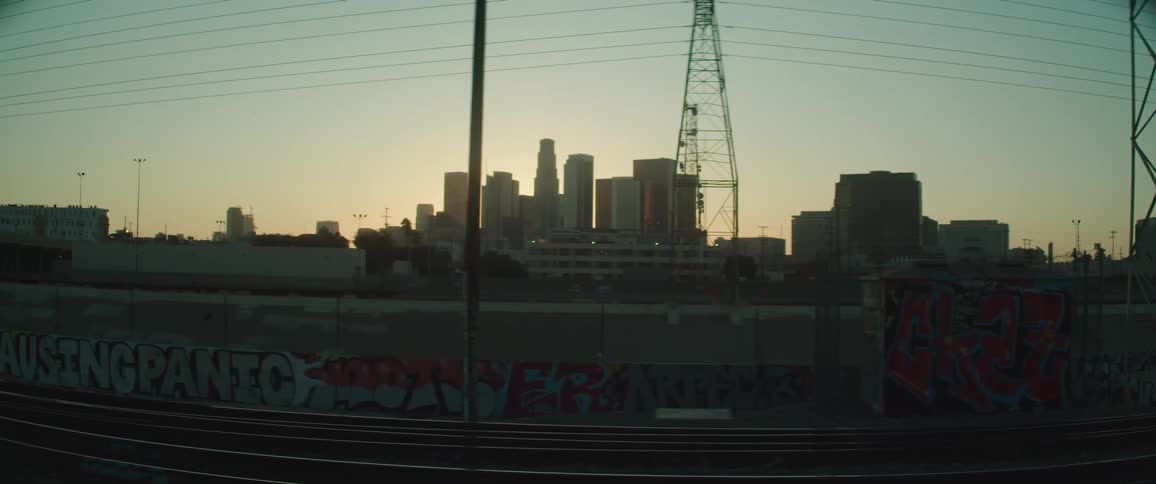 Skyline of the city with skyscrapers and tall buildings at dusk