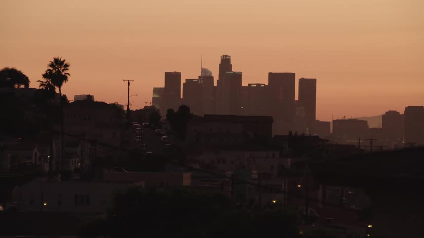 A view of skyline and buildings is displayed in the horizon
