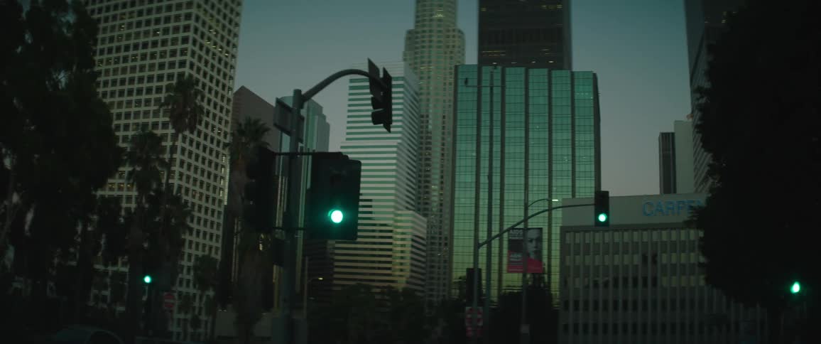 The city street is empty at dusk