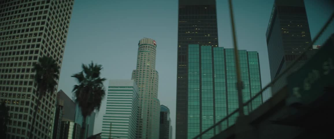 A downtown city with skyscraper buildings is displayed
