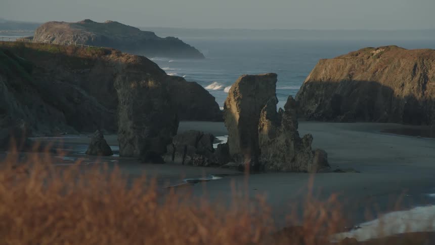 Sea stacks are surrounded by water