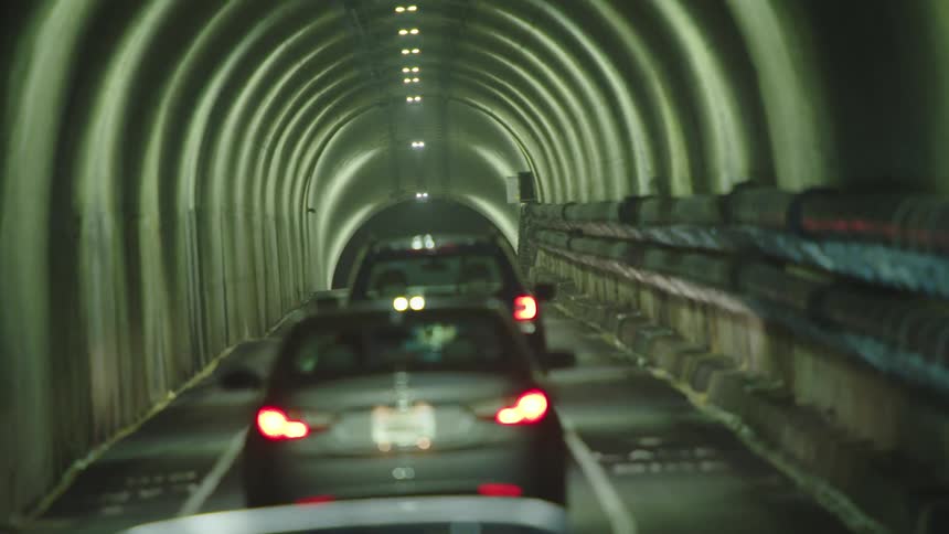 Cars driving through tunnel
