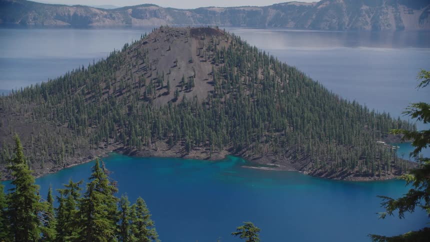 A lake in front of hills