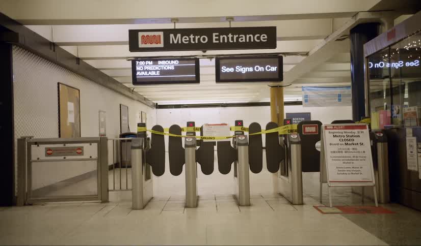 Metro entrance closed with yellow caution tape