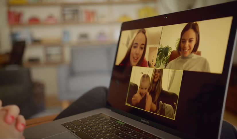 Family and friends in a video call on laptop