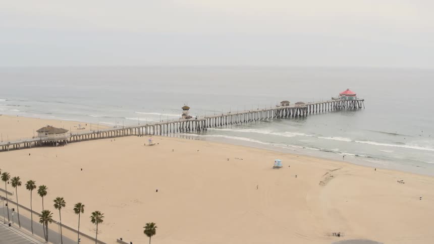 Aerial of vacant beach on a foggy day