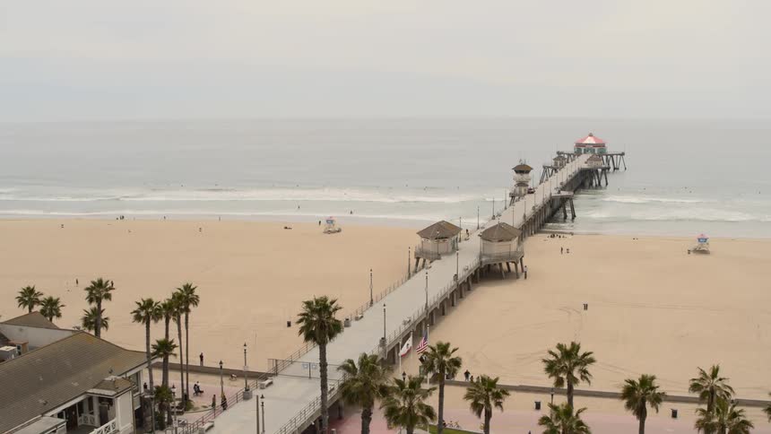 A pier leading out to a shelter extends out into open water