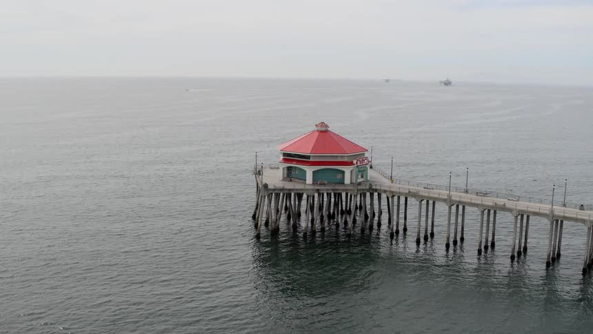 Aerial view of boardwalk pier at day