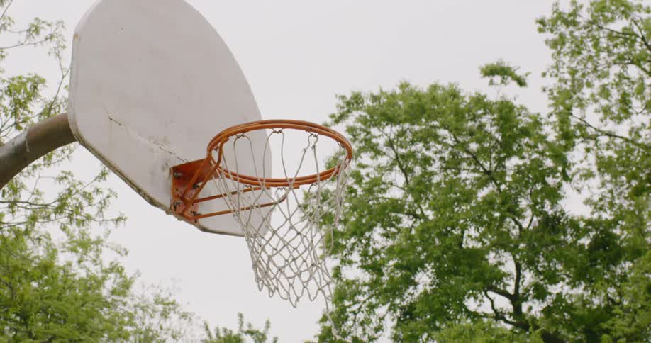 Basketball hoop on park at day