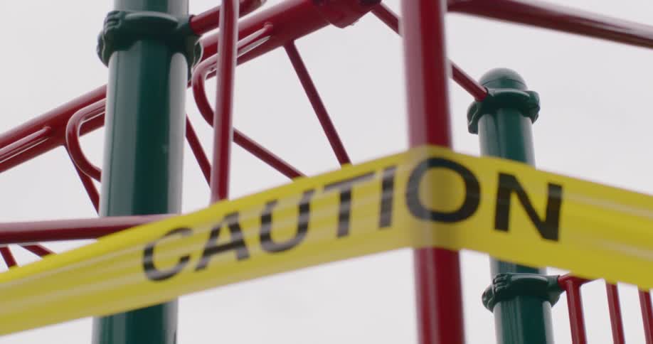 Caution tape blocks the playground