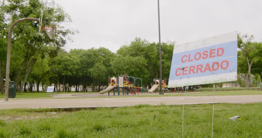 Vacant public with a closed sign near basket ball court