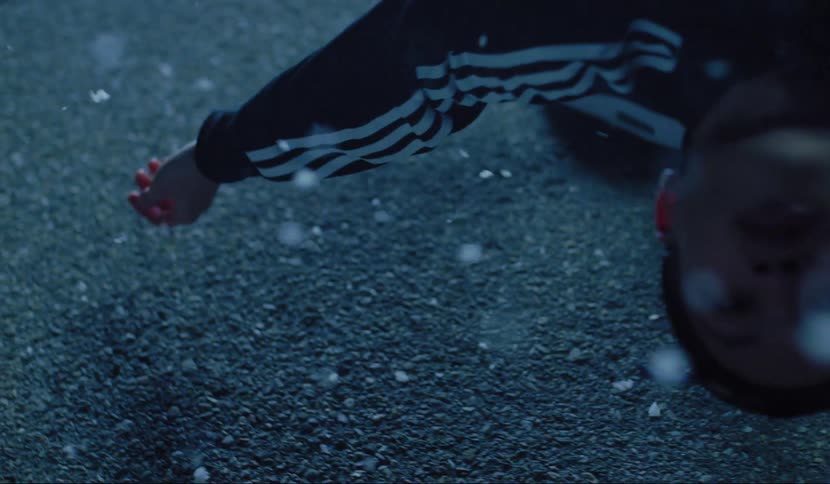 Man is frozen with back arched back head near feet