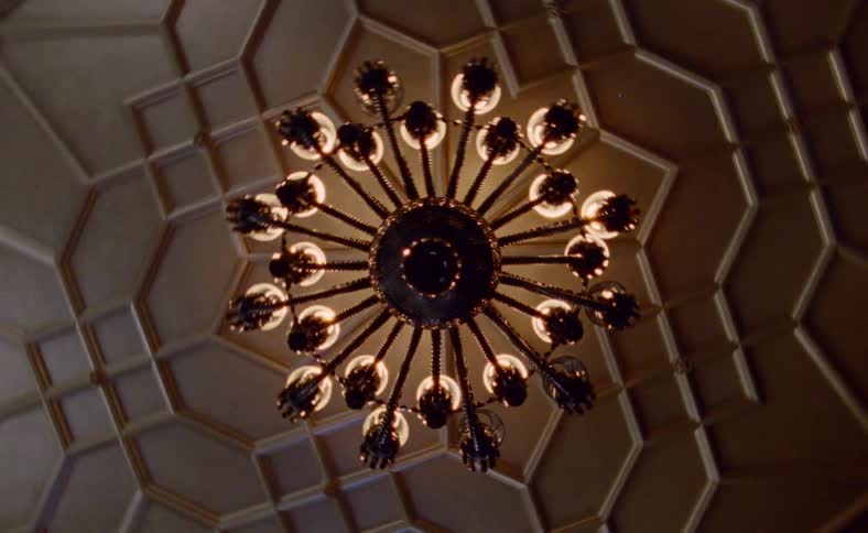 Worms eye view of a light fixture on a ceiling