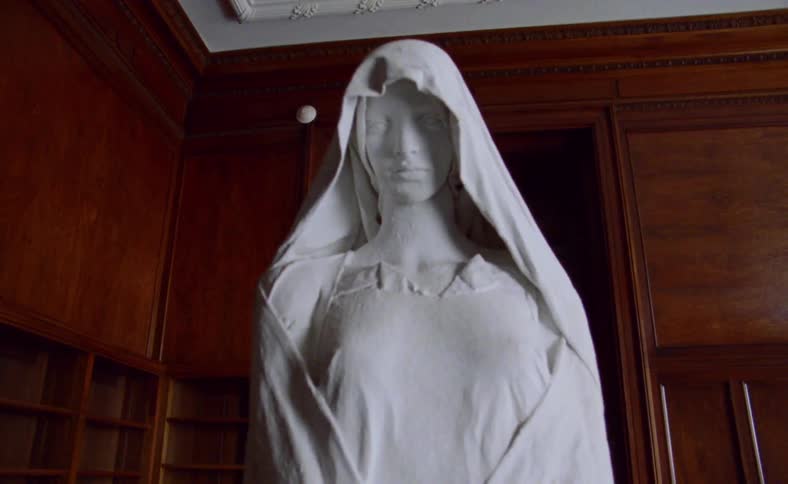 Artistic white portrait sculpture in the room