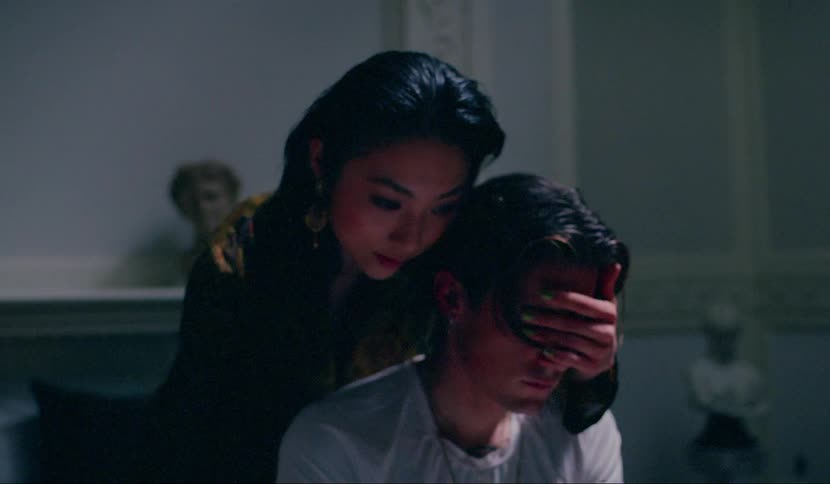 Film footage of a woman covering a boys eyes