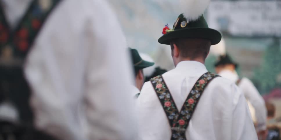 People in costume walk together forward