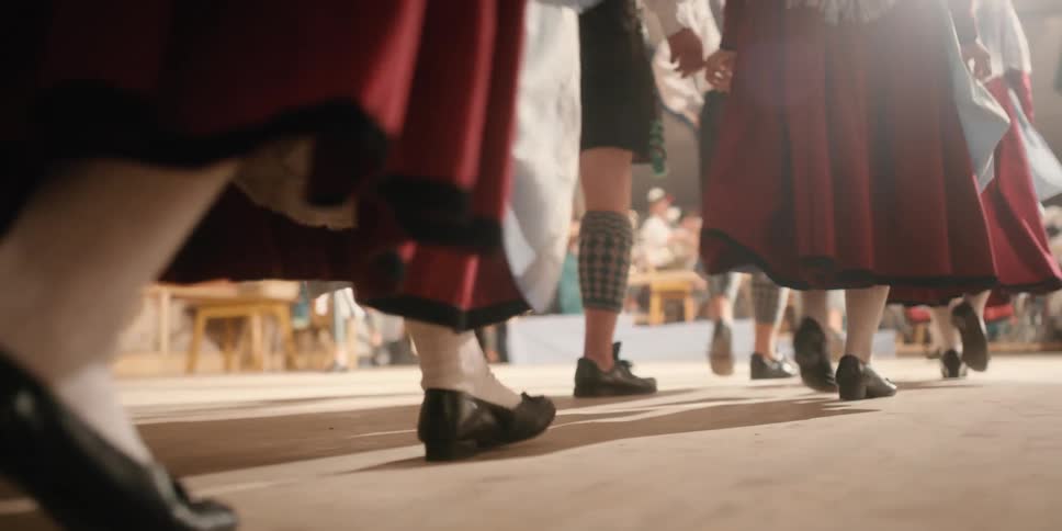 Performers walk out onto a stage
