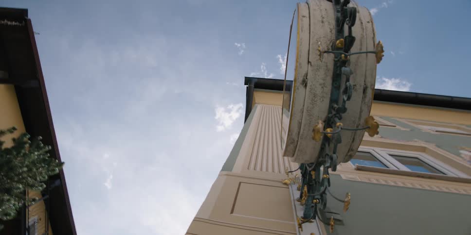 The clock is on the side of the building