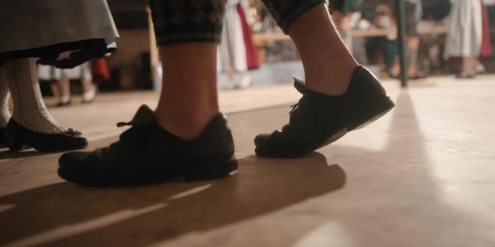 People dance together on the floor