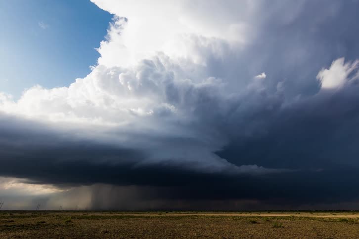 Storm clouds move across the prairie