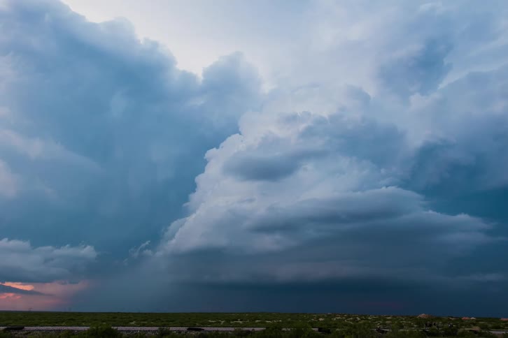 Time lapse of storm clouds passing over the land