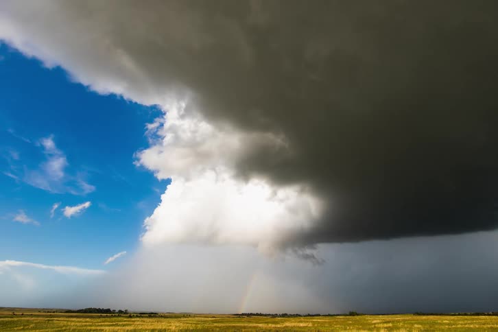 Time lapse of a cloud front over a field