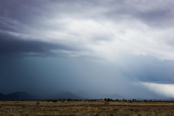 Time lapse of clouds blowing across the land during a storm