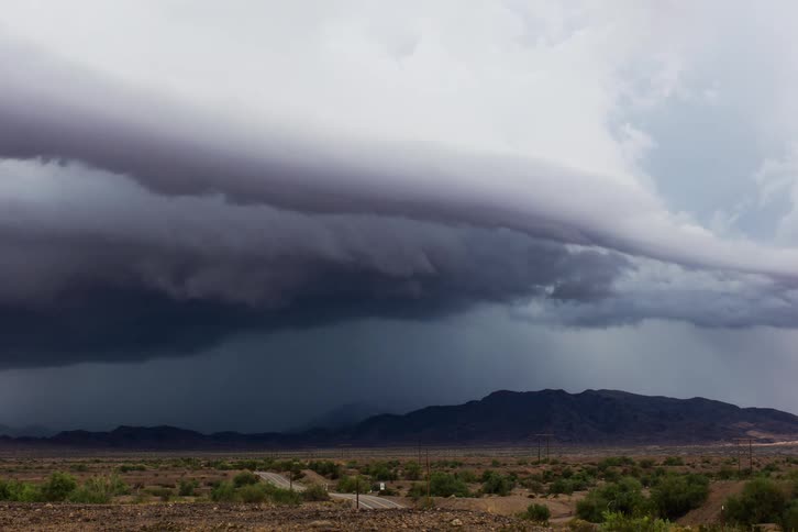 Dark stormy clothes gather over the plains