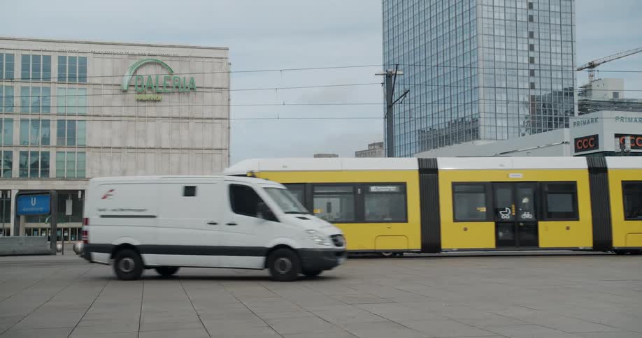 Yellow tram drives in the empty city due to corona virus