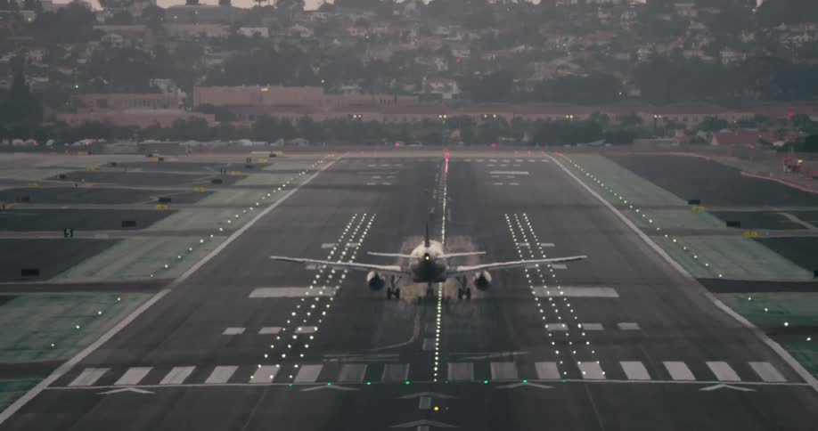 Plane takes off the runway during daylight