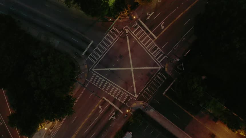 Aerial view of freeway intersection in city at night
