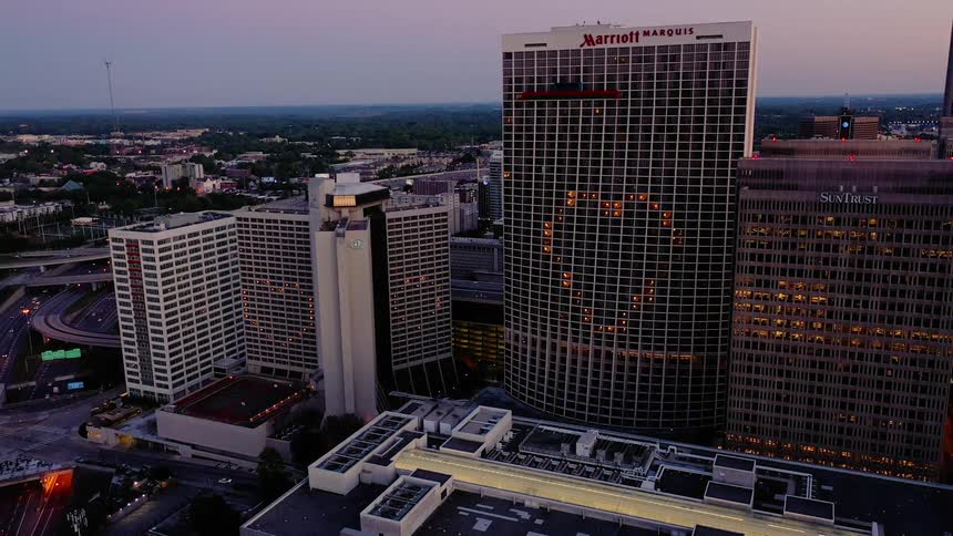 Hotels in city downtown at sunset