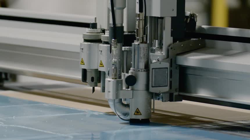 A machine cutting tiles