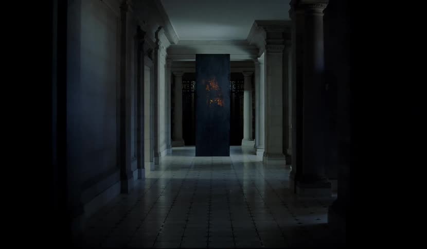 Stele standing in the middle of hallway in the luxurious house
