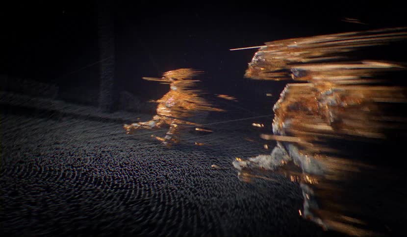 People spinning with lights and flares flying off of them