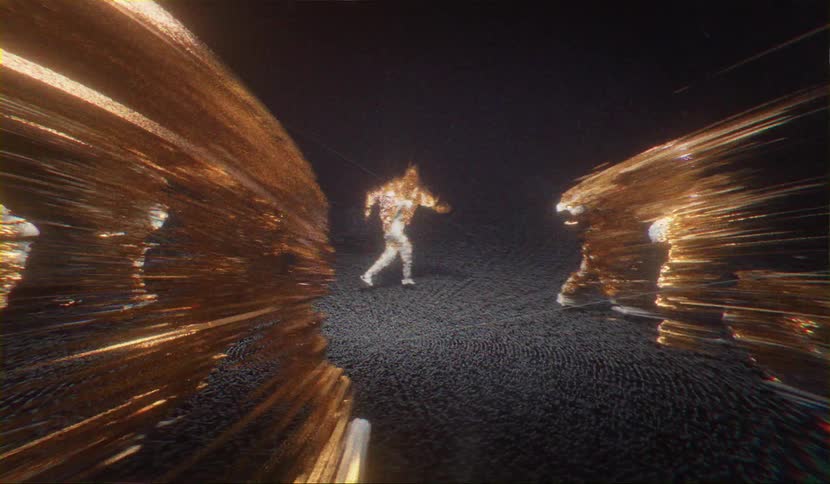 Men walking in a circle with flares coming off of their bodies