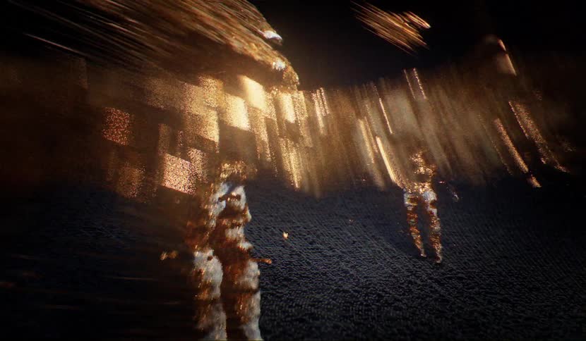 An abstract of rough human figures in gold and white flying apart and disintegrating