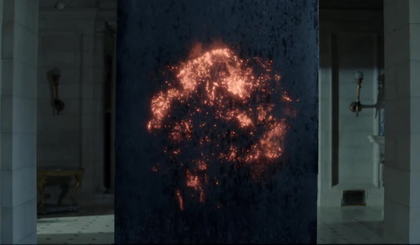 A slab of wood that appears to be burning from the inside