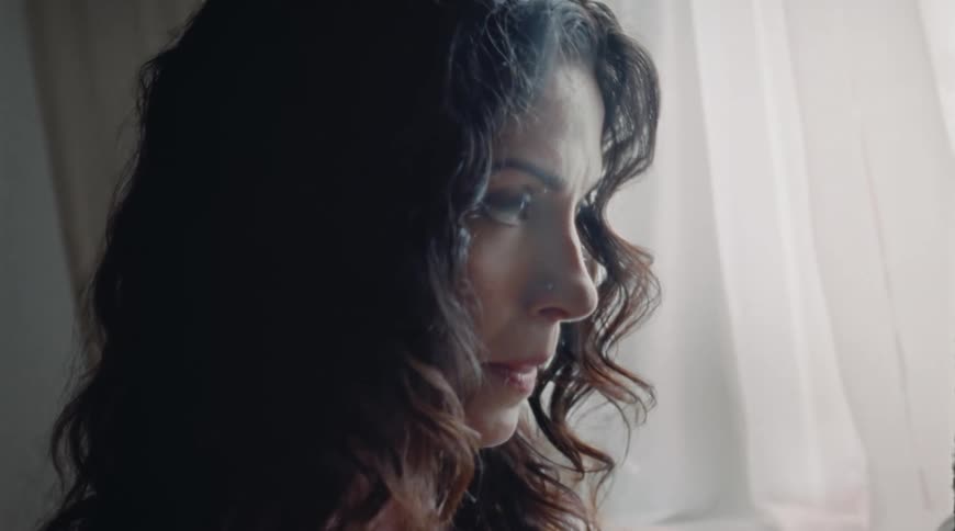 A woman looking around a room