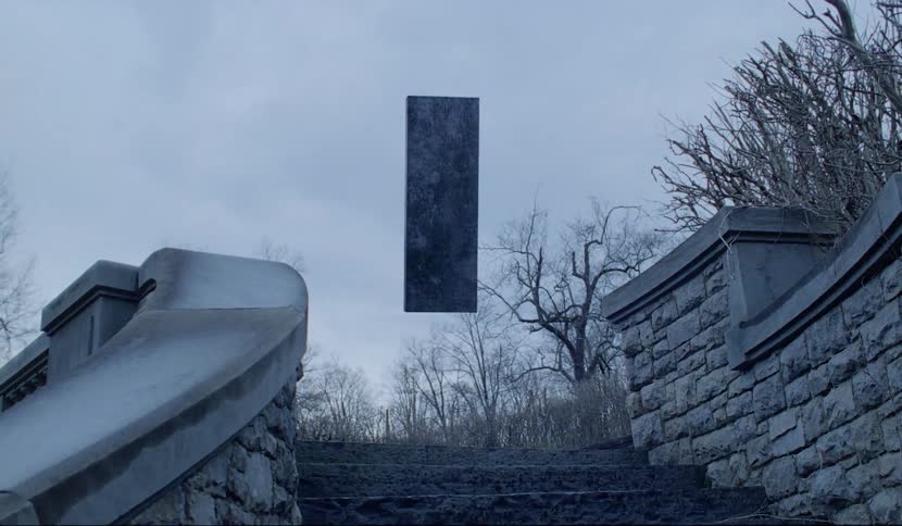 Film footage of a wooden door floating above the ground