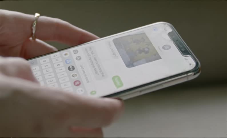 A female texts on her cellphone