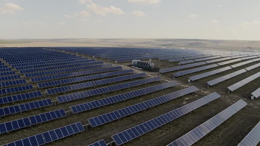 Slow rise to reveal an enormous solar energy facility