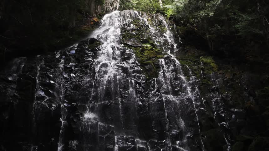 Water flows down a rock face