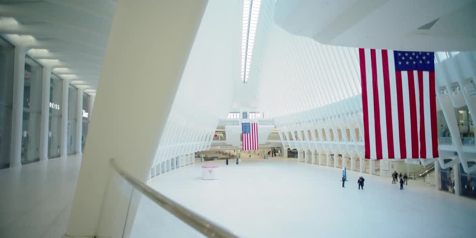 People standing and walking in a building