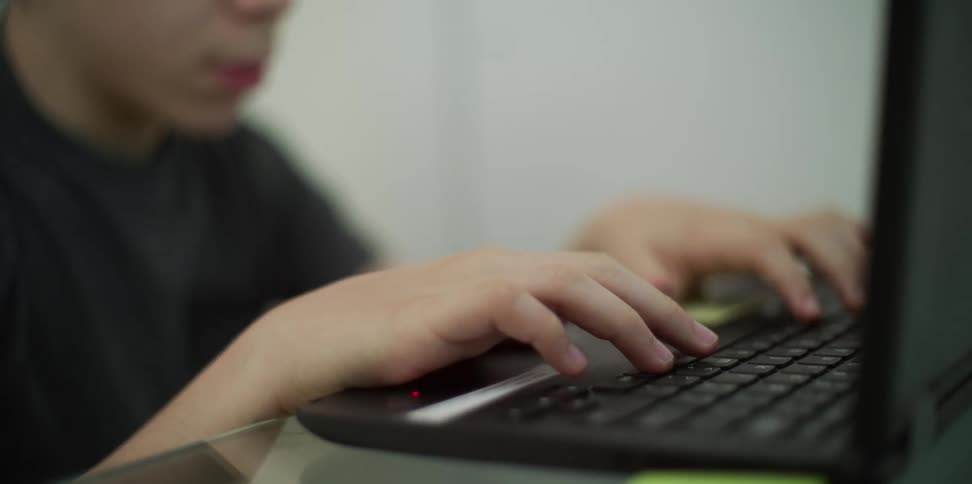 A child works on the computer
